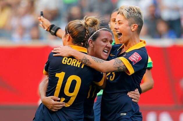 WINNIPEG, MB - JUNE 08:  Lisa De Vanna #11 of Australia celebrates her first half goal with teammates against the United States during the FIFA Women's World Cup 2015 Group D match at Winnipeg Stadium on June 8, 2015 in Winnipeg, Canada.  (Photo by Kevin C. Cox/Getty Images)