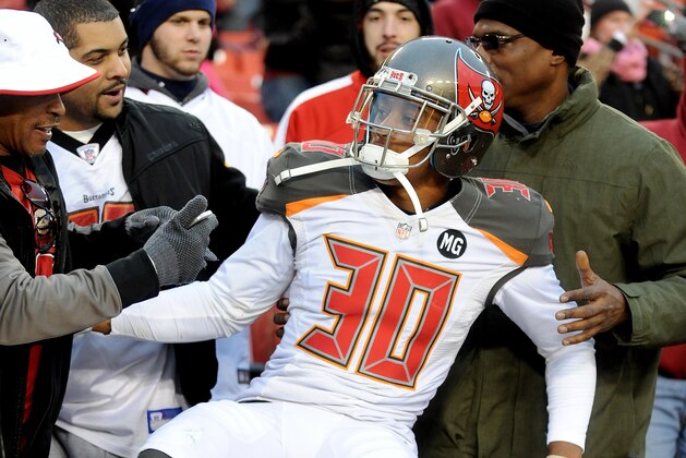 LANDOVER, MD - NOVEMBER 16: Free safety Bradley McDougald #30 of the Tampa Bay Buccaneers celebrates following the Tampa Bay Buccaneers 27-7 win over the Washington Redskins at FedExField on November 16, 2014 in Landover, Maryland.  (Photo by Mitchell Layton/Getty Images)