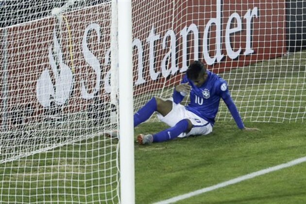 Brazil's Neymar reacts after failing to score during a Copa America Group C soccer match against Colombia  at the Monumental stadium in Santiago, Chile, Wednesday, June 17, 2015. (AP Photo/Silvia Izquierdo)