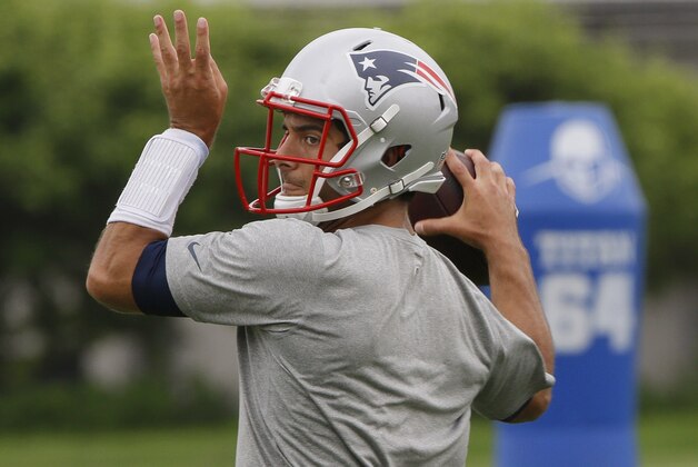 New England Patriots backup quarterback Jimmy Garoppolo (10) throws a pass during an NFL football minicamp Tuesday, June 16, 2015, in Foxborough, Mass. (AP Photo/Stephan Savoia)
