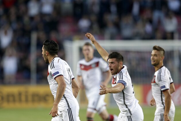 Germany’s Emre Can, left, celebrates with teammates after scoring a goal during their Euro U21 soccer championship group A match between Germany and Serbia, in Prague, Czech Republic, Wednesday, June 17, 2015. (AP Photo/Petr David Josek)