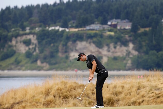 Dustin Johnson watches his putt on the third hole during the first round of the U.S. Open golf tournament at Chambers Bay on Thursday, June 18, 2015 in University Place, Wash. (AP Photo/Matt York) Dustin Johnson watches his putt on the third hole during the first round of the U.S. Open golf tournament at Chambers Bay on Thursday, June 18, 2015 in University Place, Wash. (AP Photo/Matt York)