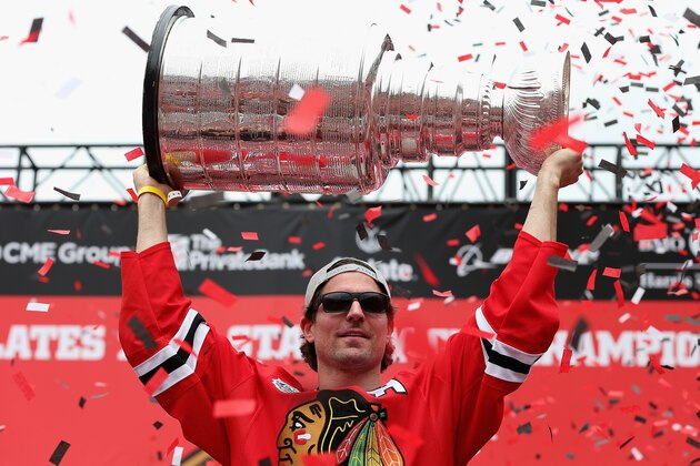 CHICAGO, IL - JUNE 18: Patrick Sharp #10 of the Chicago Blackhawks holds the Stanley Cup trophy during the Chicago Blackhawks Stanley Cup Championship Rally at Soldier Field on June 18, 2015 in Chicago, Illinois.  (Photo by Jonathan Daniel/Getty Images)
