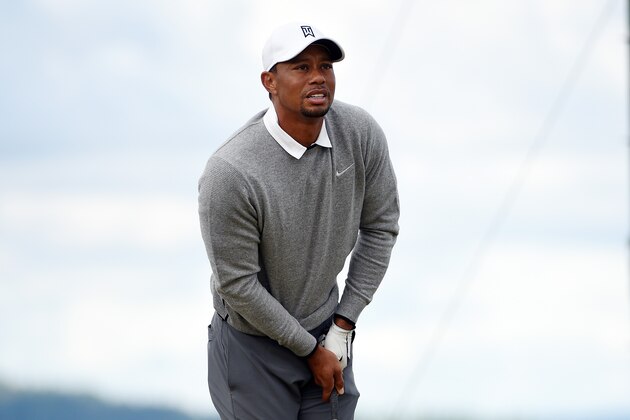 UNIVERSITY PLACE, WA - JUNE 19:  Tiger Woods of the United States reacts to his tee shot on the 12th hole during the second round of the 115th U.S. Open Championship at Chambers Bay on June 19, 2015 in University Place, Washington.  (Photo by Ross Kinnaird/Getty Images)
