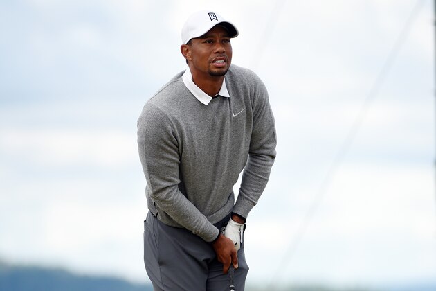 UNIVERSITY PLACE, WA - JUNE 19:  Tiger Woods of the United States reacts to his tee shot on the 12th hole during the second round of the 115th U.S. Open Championship at Chambers Bay on June 19, 2015 in University Place, Washington.  (Photo by Ross Kinnaird/Getty Images)