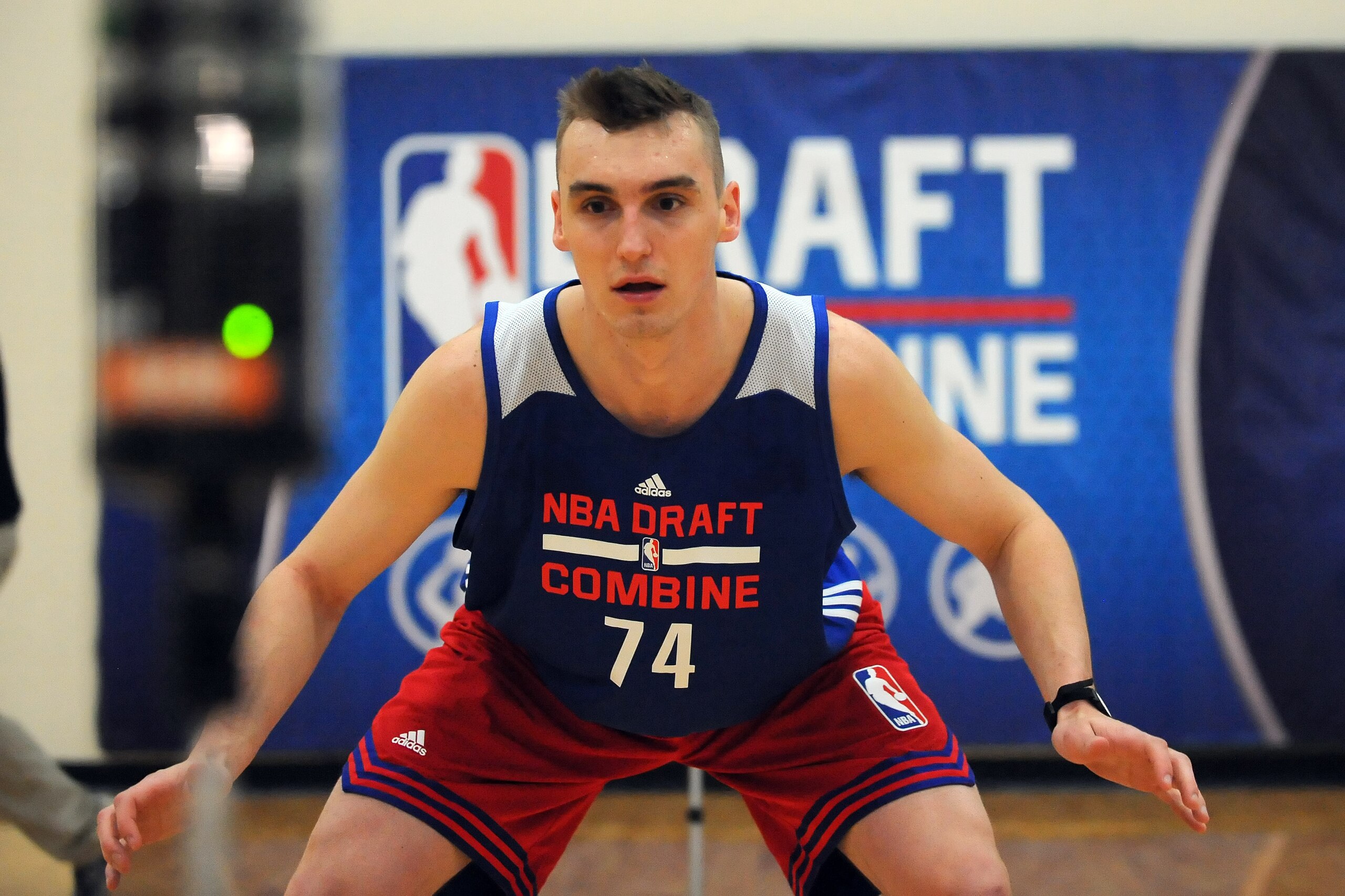CHICAGO, IL - MAY 14:  Sam Dekker #74 prepares for a shuttle run drill during the 2015 NBA Draft Combine on May 14, 2015 at Quest Multiplex in Chicago, Illinois. NOTE TO USER: User expressly acknowledges and agrees that, by downloading and/or using this photograph, user is consenting to the terms and conditions of the Getty Images License Agreement.  Mandatory Copyright Notice: Copyright 2013 NBAE (Photo by Randy Belice/NBAE via Getty Images)
