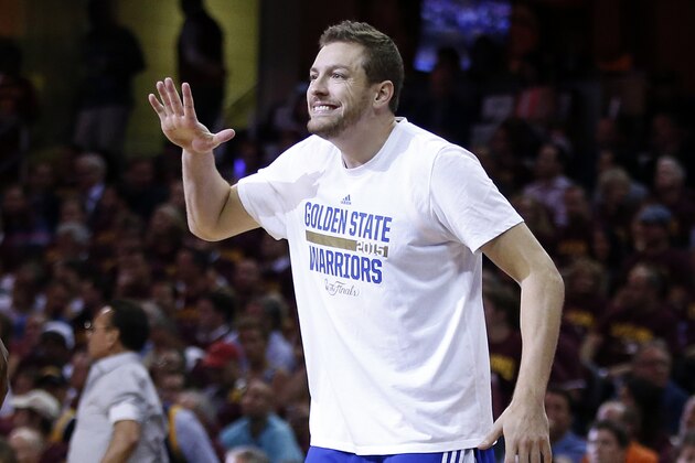 CLEVELAND, OH - JUNE 16:  David Lee #10 of the Golden State Warriors celebrates during Game Six of the 2015 NBA Finals against the Cleveland Cavaliers at Quicken Loans Arena on June 16, 2015 in Cleveland, Ohio. NOTE TO USER: User expressly acknowledges and agrees that, by downloading and or using this photograph, user is consenting to the terms and conditions of Getty Images License Agreement.  (Photo by Ezra Shaw/Getty Images)