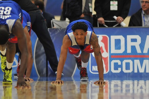 CHICAGO, IL - MAY 14:  Mouhammadou Jaiteh #85 and Cameron Payne #4 complete a stretching drill during the 2015 NBA Draft Combine on May 14, 2015 at Quest Multiplex in Chicago, Illinois. NOTE TO USER: User expressly acknowledges and agrees that, by downloading and/or using this photograph, user is consenting to the terms and conditions of the Getty Images License Agreement.  Mandatory Copyright Notice: Copyright 2013 NBAE (Photo by Randy Belice/NBAE via Getty Images)