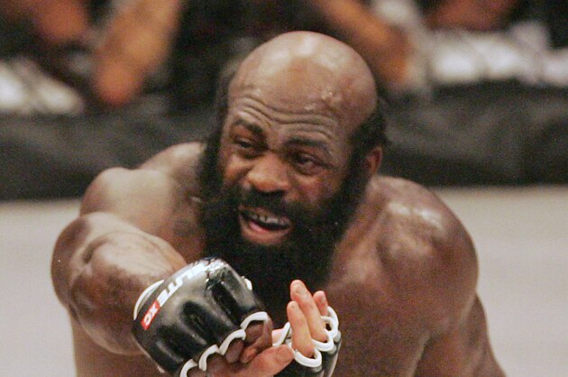 Kimbo Slice, right, throws a punch at James Thompson of Manchester, England during the second round of their EliteXC heavyweight bout at the Prudential Center in Newark, N.J. Saturday, May 31, 2008. Slice won in the third round on a TKO. (AP Photo/Rich Schultz)