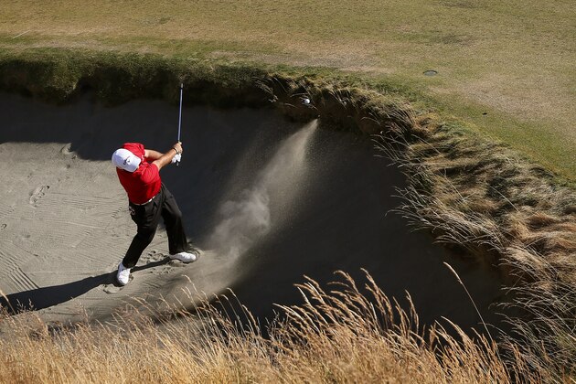 Patrick Reed hits out of the bunker on the 10th hole during the second round of the U.S. Open golf tournament at Chambers Bay on Friday, June 19, 2015 in University Place, Wash. (AP Photo/Matt York)