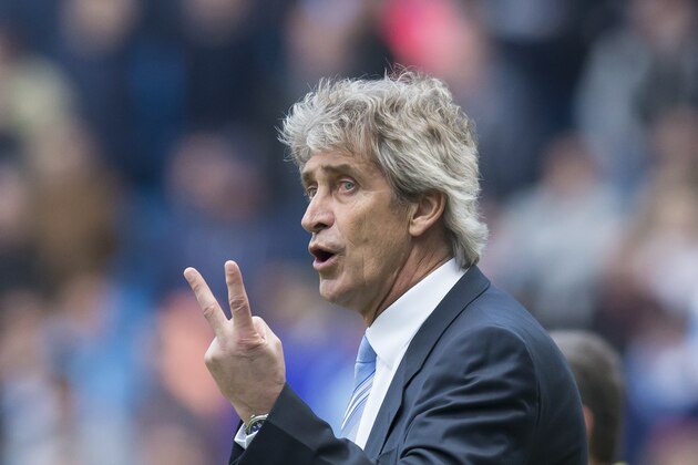 Manchester City's manager Manuel Pellegrini gestures as his team beats West Ham United 2-0 during the English Premier League soccer match between Manchester City and West Ham United at the Etihad Stadium, Manchester, England, Sunday April 19, 2015. (AP Photo/Jon Super)