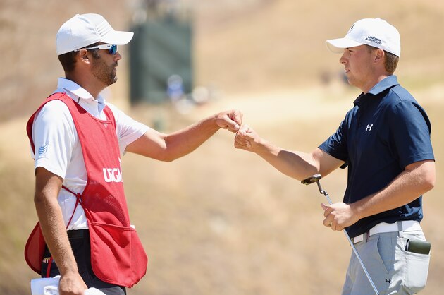 UNIVERSITY PLACE, WA - JUNE 19:  Jordan Spieth of the United States celebrates with his caddie Michael Greller after a birdie putt on the ninth green during the second round of the 115th U.S. Open Championship at Chambers Bay on June 19, 2015 in University Place, Washington.  (Photo by Harry How/Getty Images)