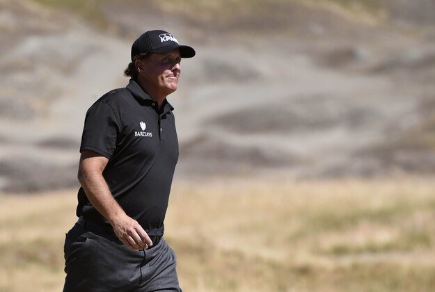 Jun 19, 2015; University Place, WA, USA; Phil Mickelson walks off the 14th green in the second round of the 2015 U.S. Open golf tournament at Chambers Bay. Mandatory Credit: Kyle Terada-USA TODAY Sports