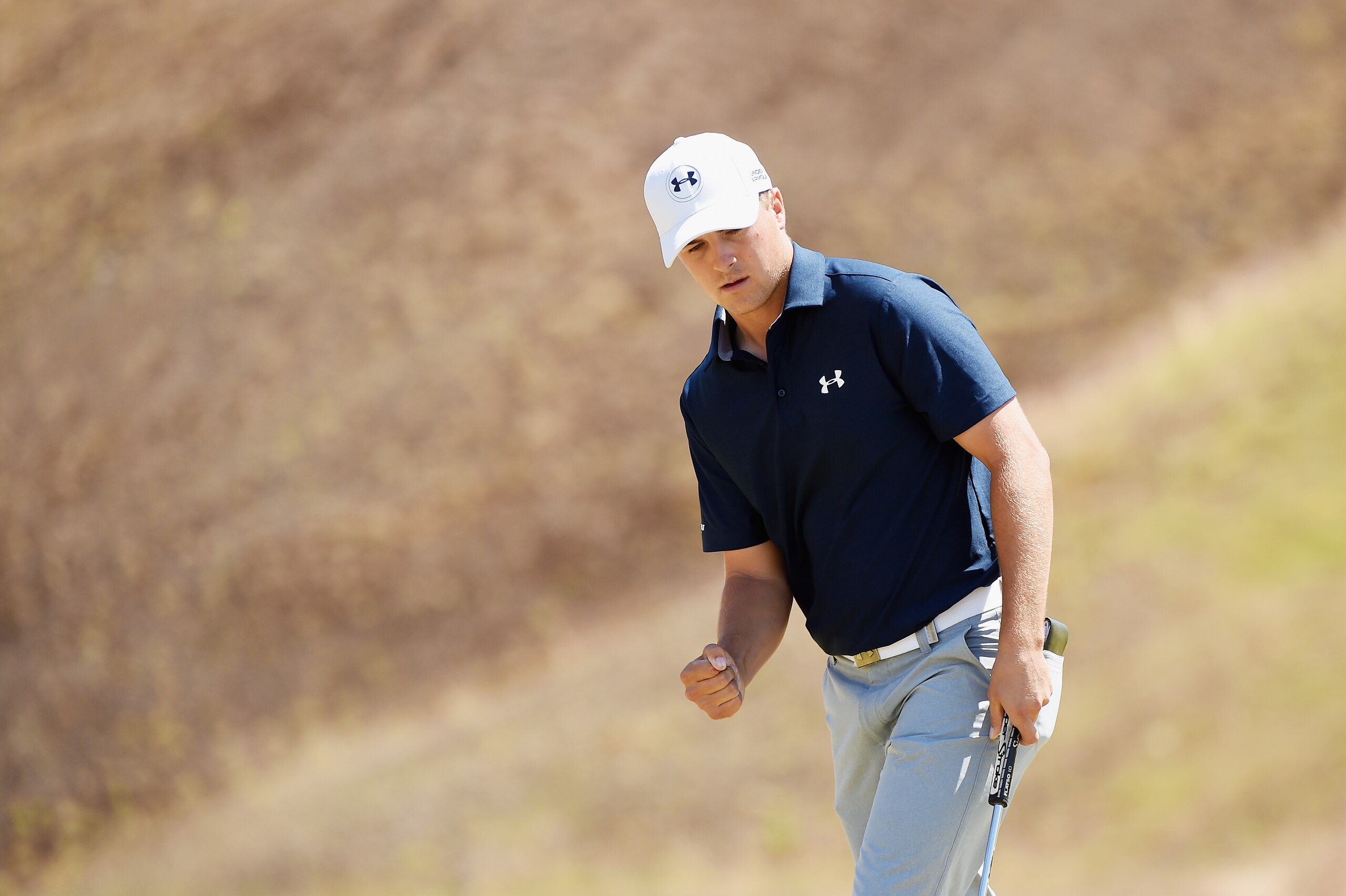 UNIVERSITY PLACE, WA - JUNE 19:  Jordan Spieth of the United States celebrates after a birdie putt on the ninth green during the second round of the 115th U.S. Open Championship at Chambers Bay on June 19, 2015 in University Place, Washington.  (Photo by Harry How/Getty Images)