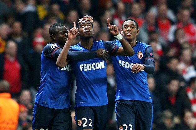 LONDON, ENGLAND - FEBRUARY 25:  Geoffrey  Kondogbia #22 (C) of Monaco celebates with teammates after scoring the opening goal during the UEFA Champions League round of 16, first leg match between Arsenal and Monaco at The Emirates Stadium on February 25, 2015 in London, United Kingdom.  (Photo by Clive Mason/Getty Images)