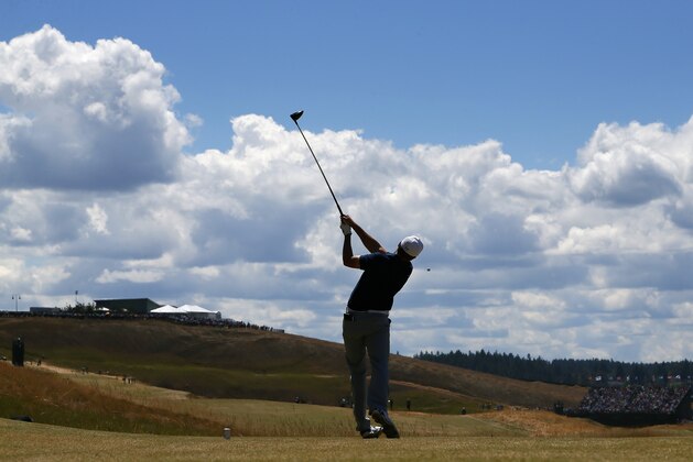 Jordan Spieth watches his tee shot on the eighth hole during the second round of the U.S. Open golf tournament at Chambers Bay on Friday, June 19, 2015 in University Place, Wash. (AP Photo/Matt York)