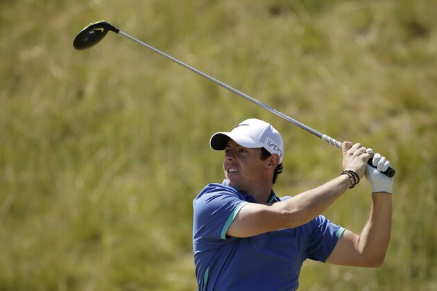 Rory McIlroy, of Northern Ireland, watches his tee shot on the seventh hole during the third round of the U.S. Open golf tournament at Chambers Bay on Saturday, June 20, 2015 in University Place, Wash. (AP Photo/Charlie Riedel)