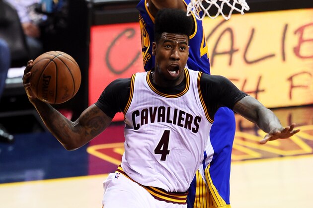 CLEVELAND, OH - JUNE 16:  Iman Shumpert #4 of the Cleveland Cavaliers goes up against Harrison Barnes #40 of the Golden State Warriors in the second quarter during Game Six of the 2015 NBA Finals at Quicken Loans Arena on June 16, 2015 in Cleveland, Ohio. NOTE TO USER: User expressly acknowledges and agrees that, by downloading and or using this photograph, user is consenting to the terms and conditions of Getty Images License Agreement.  (Photo by Jason Miller/Getty Images)