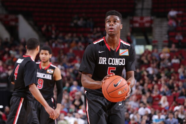 PORTLAND, OR - APRIL 12:  Emmanuel Mudiay #5 of the World Team shoots the ball during the game against Team USA on April 12, 2014 at the Moda Center Arena in Portland, Oregon. NOTE TO USER: User expressly acknowledges and agrees that, by downloading and or using this photograph, user is consenting to the terms and conditions of the Getty Images License Agreement. Mandatory Copyright Notice: Copyright 2014 NBAE (Photo by Sam Forencich/NBAE via Getty Images)