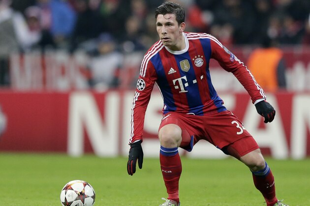 FILE - In this Dec. 10, 2014 file picture Bayern's Pierre-Emile Hojbjerg from Denmark controls the ball during the Champions League group E soccer match between FC Bayern Munich and CSKA Moscow in Munich, Germany. Bayern Munich is giving Denmark defender Pierre-Emile Hojbjerg a three-year contract extension and sending him on loan to Bundesliga rival Augsburg for the rest of this season. Bayern director of sport Matthias Sammer said Thursday Jan. 8, 2015  that the Bundesliga champion will extend the 19-year-old Hojbjerg’s contract until 2018 as a “clear sign that Bayern is counting on him in the future.”   (AP Photo/Matthias Schrader,File)