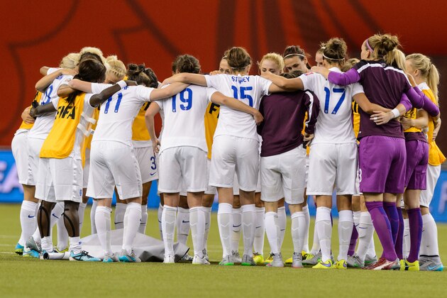 MONTREAL, QC - JUNE 17:  Members of team England huddle after defeating Colombia during the 2015 FIFA Women's World Cup Group F match at Olympic Stadium on June 17, 2015 in Montreal, Quebec, Canada.  England defeated Colombia 2-1. (Photo by Minas Panagiotakis/Getty Images)