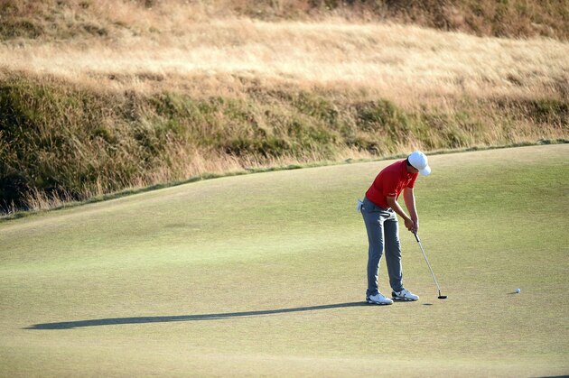 UNIVERSITY PLACE, WA - JUNE 20: Jordan Spieth of the United States putts on the 18th green during the third round of the 115th U.S. Open Championship at Chambers Bay on June 20, 2015 in University Place, Washington.  (Photo by Harry How/Getty Images)