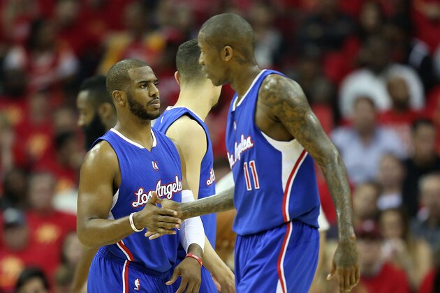 May 12, 2015; Houston, TX, USA; Los Angeles Clippers guard Chris Paul (3) is congratulated by guard Jamal Crawford (11) while playing against the Houston Rockets in the first half in game five of the second round of the NBA Playoffs at Toyota Center. Mandatory Credit: Thomas B. Shea-USA TODAY Sports