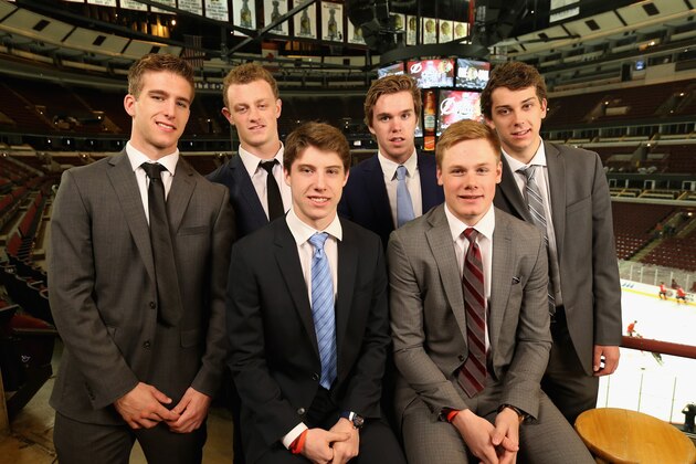 CHICAGO, IL - JUNE 08:  NHL top draft prospects (back row, L-R) Noah Hanafin, Jack Eichel, Connor McDavid, Dylan Strome, (front row, L-R) Mitchell Marner and Lawson Crouse pose for a picture during media availability at United Center on June 8, 2015 in Chicago, Illinois.  (Photo by Dave Sandford/NHLI via Getty Images)