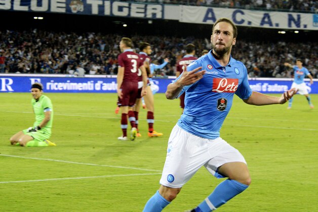Napoli's Gonzalo Higuaín celebrates after scoring during a Serie A soccer match between Napoli and Lazio, at the San Paolo stadium in Naples, Italy, Sunday, May 31, 2015 . (AP Photo/Salvatore Laporta)