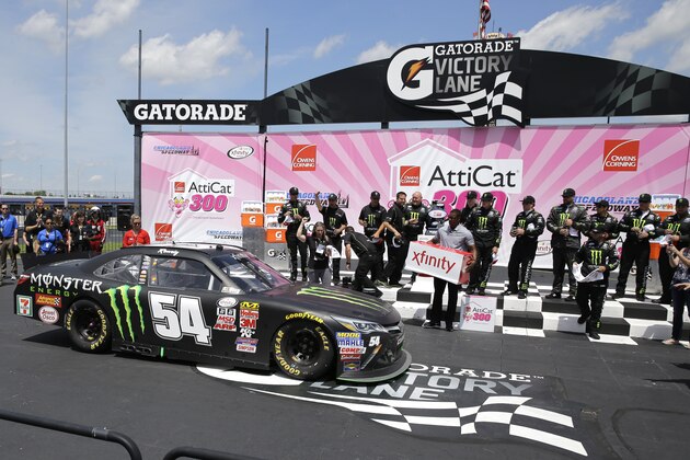 Erik Jones (54) arrives at Victory Lane after winning the NASCAR Xfinity series auto race at Chicagoland Speedway, Sunday, June 21, 2015, in Joliet, Ill. (AP Photo/Nam Y. Huh)