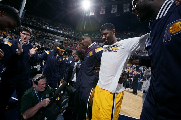 INDIANAPOLIS - APRIL 5: Paul George #13 of the Indiana Pacers huddles with teamates before a game against the Miami Heat at Bankers Life Fieldhouse on April 5, 2015 in Indianapolis, Indiana. NOTE TO USER: User expressly acknowledges and agrees that, by downloading and or using this Photograph, user is consenting to the terms and condition of the Getty Images License Agreement. Mandatory Copyright Notice: 2015 NBAE (Photo by Ron Hoskins/NBAE via Getty Images) INDIANAPOLIS - APRIL 5: Paul George #13 of the Indiana Pacers huddles with teamates before a game against the Miami Heat at Bankers Life Fieldhouse on April 5, 2015 in Indianapolis, Indiana. NOTE TO USER: User expressly acknowledges and agrees that, by downloading and or using this Photograph, user is consenting to the terms and condition of the Getty Images License Agreement. Mandatory Copyright Notice: 2015 NBAE (Photo by Ron Hoskins/NBAE via Getty Images)