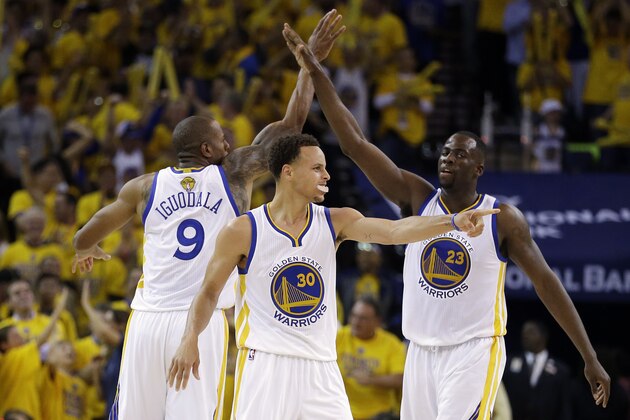 Golden State Warriors guard Stephen Curry, center, forward Andre Iguodala (9) and forward Draymond Green, right, react during the second half of Game 5 of basketball's NBA Finals against the Cleveland Cavaliers in Oakland, Calif., Sunday, June 14, 2015. (AP Photo/Ben Margot) Golden State Warriors guard Stephen Curry, center, forward Andre Iguodala (9) and forward Draymond Green, right, react during the second half of Game 5 of basketball's NBA Finals against the Cleveland Cavaliers in Oakland, Calif., Sunday, June 14, 2015. (AP Photo/Ben Margot)