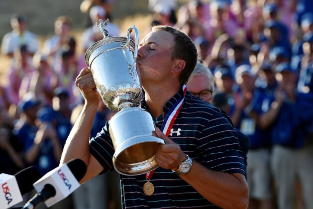 UNIVERSITY PLACE, WA - JUNE 21:  Jordan Spieth of the United States kisses the trophy after winning the 115th U.S. Open Championship at Chambers Bay on June 21, 2015 in University Place, Washington.  (Photo by Ross Kinnaird/Getty Images)