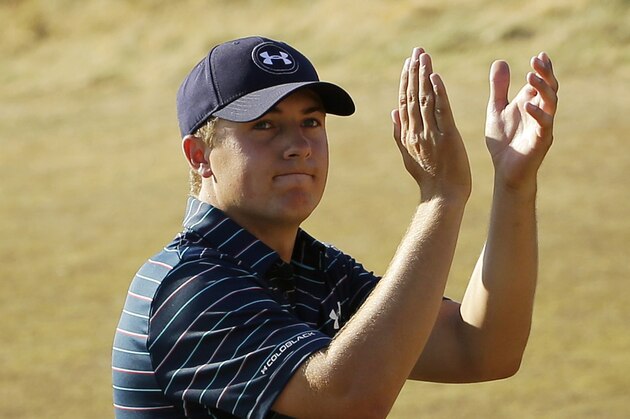 Jordan Spieth claps after finishing final round of the U.S. Open golf tournament at Chambers Bay on Sunday, June 21, 2015 in University Place, Wash. Spieth won the championship. (AP Photo/Ted S. Warren)