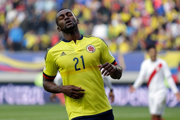 Colombia's Jackson Martinez reacts after missing a chance to score during a Copa America Group C soccer match against Peru at  the Bicentenario German Becker stadium in  Temuco, Chile, Sunday, June 21, 2015. (AP Photo/Natacha Pisarenko)