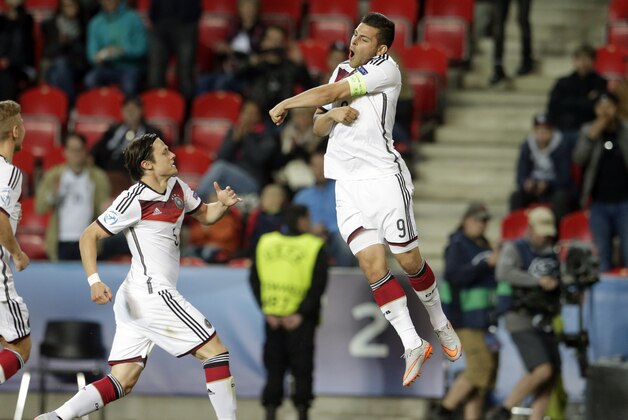 Germany’s Kevin Volland, right celebrates with Nico Schulz after scoring a goal during the Euro U21 soccer championship group A match between Germany and Denmark, at the Eden stadium stadium in Prague, Czech Republic, Saturday, June 20, 2015. (AP Photo/Petr David Josek)
