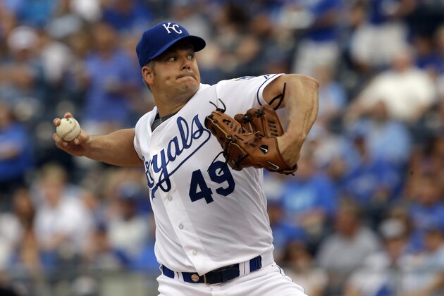 Kansas City Royals starting pitcher Joe Blanton delivers to a Milwaukee Brewers batter during the first inning of an inter-league baseball game at Kauffman Stadium in Kansas City, Mo., Wednesday, June 17, 2015. (AP Photo/Orlin Wagner)