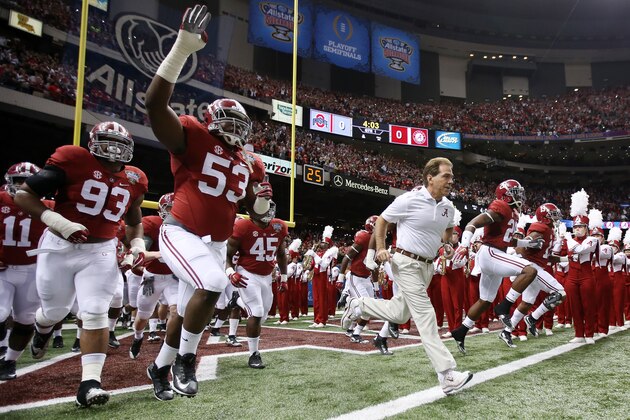 NEW ORLEANS, LA - JANUARY 01:  Head coach Nick Saban of the Alabama Crimson Tide runs on the field before playing the Ohio State Buckeyes during the All State Sugar Bowl at the Mercedes-Benz Superdome on January 1, 2015 in New Orleans, Louisiana.  (Photo by Chris Graythen/Getty Images)