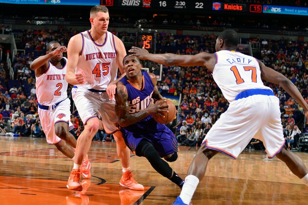 PHOENIX, AZ - MARCH 15: Eric Bledsoe #2 of the Phoenix Suns drives against the New York Knicks on March 15, 2015 at U.S. Airways Center in Phoenix, Arizona. NOTE TO USER: User expressly acknowledges and agrees that, by downloading and or using this photograph, user is consenting to the terms and conditions of the Getty Images License Agreement. Mandatory Copyright Notice: Copyright 2015 NBAE (Photo by Barry Gossage/NBAE via Getty Images)