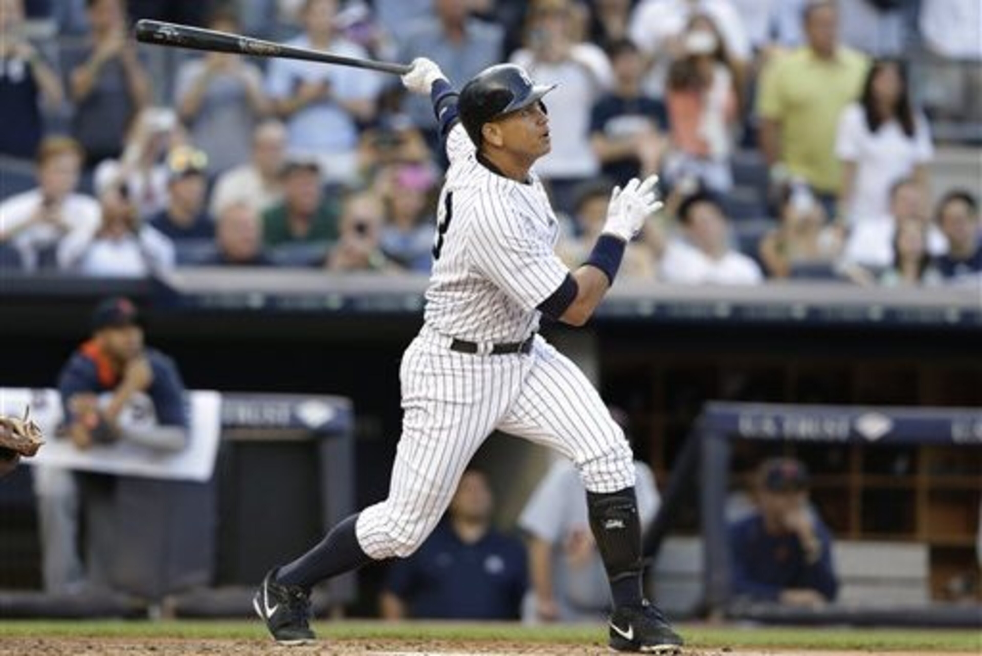 New York Yankees' Alex Rodriguez hits a home run for his 3,000th career hit, during the first inning of a baseball game against the Detroit Tigers Friday, June 19, 2015, in New York. (AP Photo/Frank Franklin II)