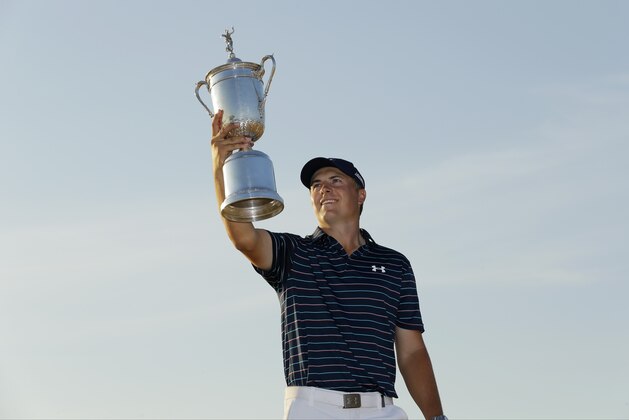 Jordan Spieth poses with the trophy after winning the U.S. Open golf tournament at Chambers Bay on Sunday, June 21, 2015 in University Place, Wash. (AP Photo/Ted S. Warren)