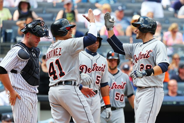 NEW YORK, NY - JUNE 21:  J.D. Martinez #28 of the Detroit Tigers celebrates with Victor Martinez #41 after hitting his third home run of the game in the sixth inning against the New York Yankees at Yankee Stadium on June 21, 2015 in the Bronx borough of New York City.  (Photo by Mike Stobe/Getty Images)