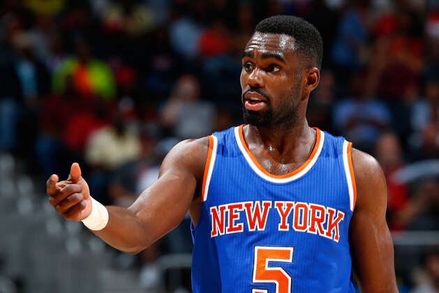 ATLANTA, GA - APRIL 13:  Tim Hardaway Jr. #5 of the New York Knicks reacts after a basket against the Atlanta Hawks at Philips Arena on April 13, 2015 in Atlanta, Georgia.  NOTE TO USER: User expressly acknowledges and agrees that, by downloading and/or using this photograph, user is consenting to the terms and conditions of the Getty Images License Agreement.  (Photo by Kevin C. Cox/Getty Images)