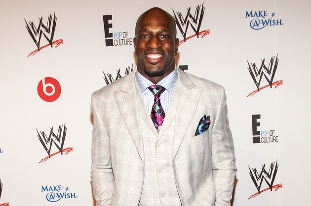 WWE Superstar Thaddeus Bullard (AKA Titus O'Neil) (shoe detail) arrives at the Superstars of Hope honors Make A Wish Foundation event at The Beverly Hills Hotel on Thursday, August 15, 2013 in Beverly Hills, Calif. (Photo by Paul A. Hebert/Invision/AP)