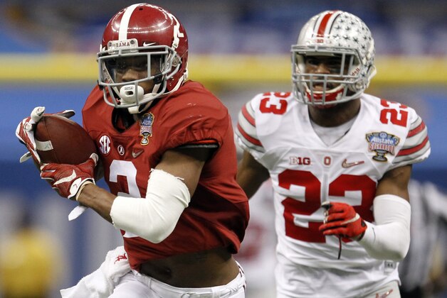 Alabama wide receiver DeAndrew White (2) catches a pass over Ohio State safety Tyvis Powell (23) for a first down in the second half of an NCAA college football game Thursday, Jan. 1, 2015, in New Orleans. (AP Photo/Butch Dill)