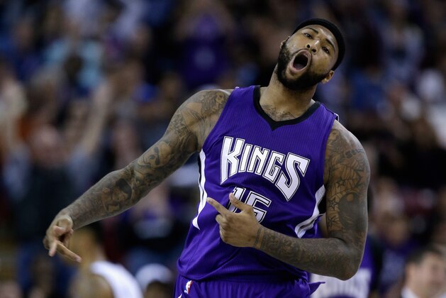 SACRAMENTO, CA - FEBRUARY 25:  DeMarcus Cousins #15 of the Sacramento Kings reacts after making a basket in the fourth quarter of their game against the Memphis Grizzlies at Sleep Train Arena on February 25, 2015 in Sacramento, California.  NOTE TO USER: User expressly acknowledges and agrees that, by downloading and or using this photograph, User is consenting to the terms and conditions of the Getty Images License Agreement.  (Photo by Ezra Shaw/Getty Images)