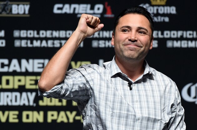 LAS VEGAS, NV - JULY 11:  President of Golden Boy Promotions Oscar De La Hoya is introduced at the official weigh-in for Canelo Alvarez and Erislandy Lara at the MGM Grand Garden Arena on July 11, 2014 in Las Vegas, Nevada. Alvarez and Lara will meet in a non-title bout on July 12.  (Photo by Ethan Miller/Getty Images)
