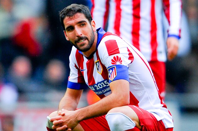 BARCELONA, SPAIN - MARCH 14:  Raul Garcia of Atletico de Madrid looks on dejected at the en of the La Liga match between RCD Espanyol and Club Atletico de Madrid at Power 8 Stadium on March 14, 2015 in Barcelona, Spain.  (Photo by David Ramos/Getty Images)
