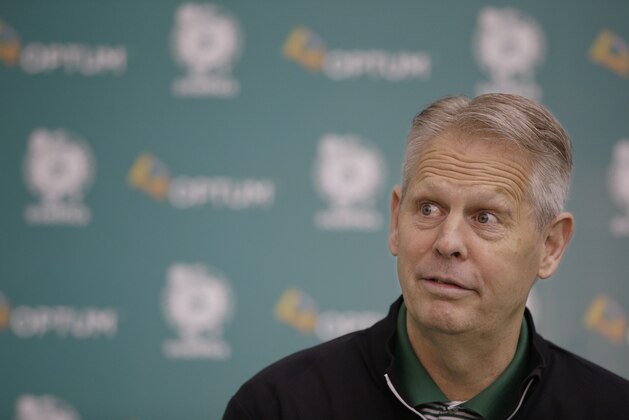 Danny Ainge, Boston Celtics president of basketball operations, listens before responding to a reporter's question during an end of season media availability at the NBA team's practice and training facility Thursday, April 30, 2015, in Waltham, Mass. (AP Photo/Stephan Savoia)