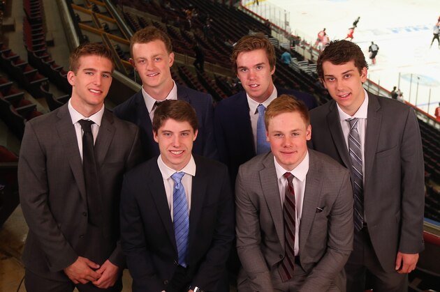 CHICAGO, IL - JUNE 08:  Upcoming NHL draft picks  (back row, l-r) Noah Hanafin, Jack Eichel, Connor McBride and Dylan Strome, and (front row l-r) Mitchell Marner and Lawson Crouse pose for a photo opportunity during media availability at United Center on June 8, 2015 in Chicago, Illinois.  (Photo by Bruce Bennett/Getty Images)